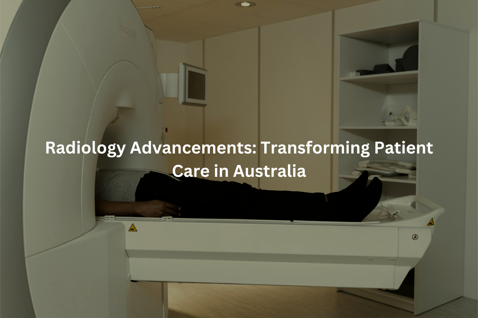 A patient undergoing a radiological procedure, with the machine's curved opening and control panels visible in the frame.