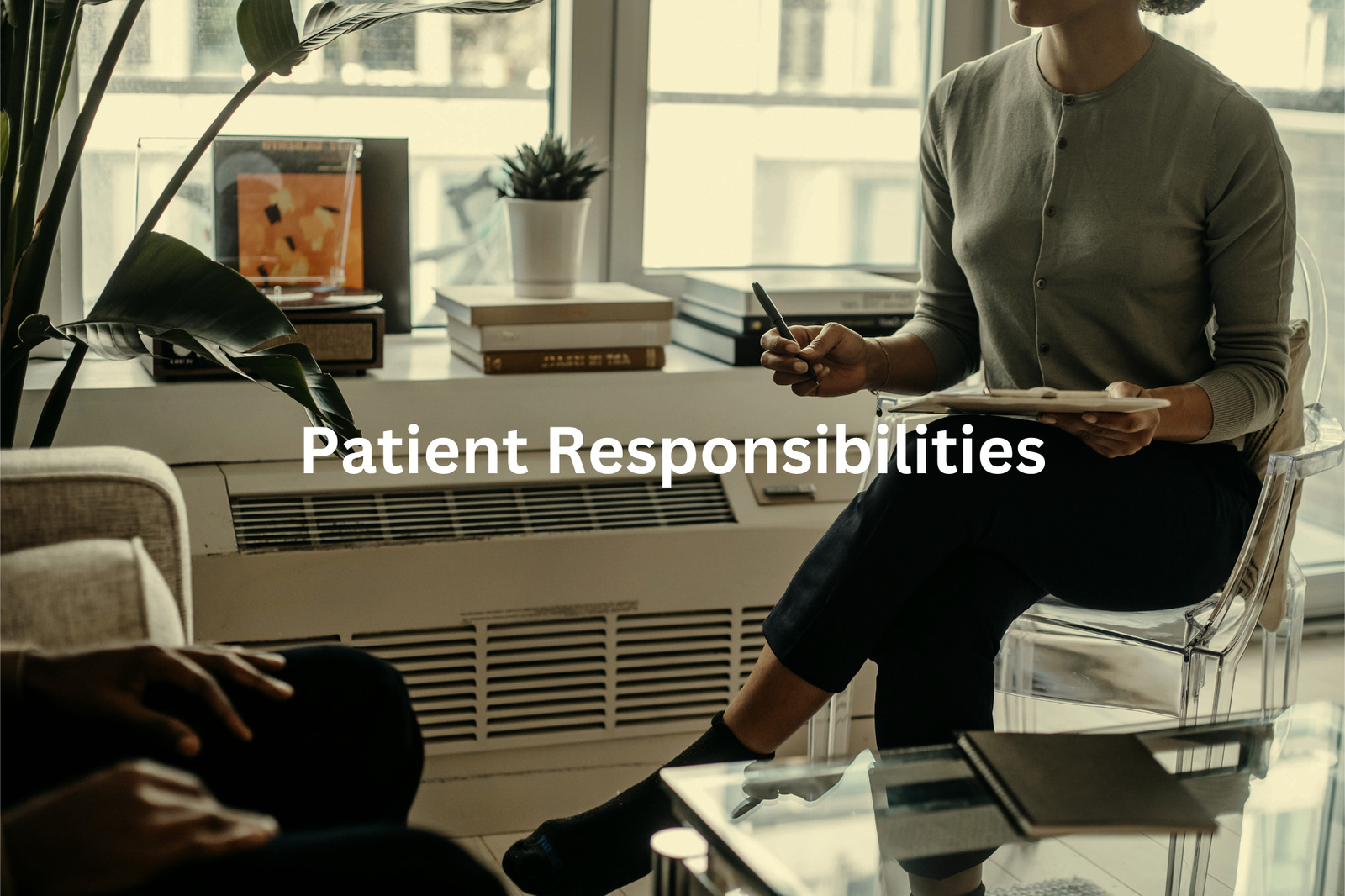 Healthcare professional reviewing patient responsibilities and guidelines while seated in a comfortable office setting