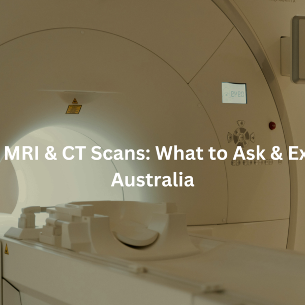 A medical imaging machine, likely an MRI or CT scanner, shown in a hospital or medical setting.