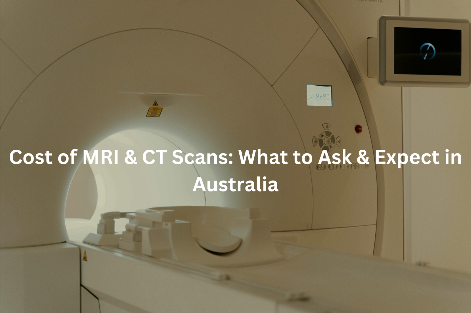 A medical imaging machine, likely an MRI or CT scanner, shown in a hospital or medical setting.