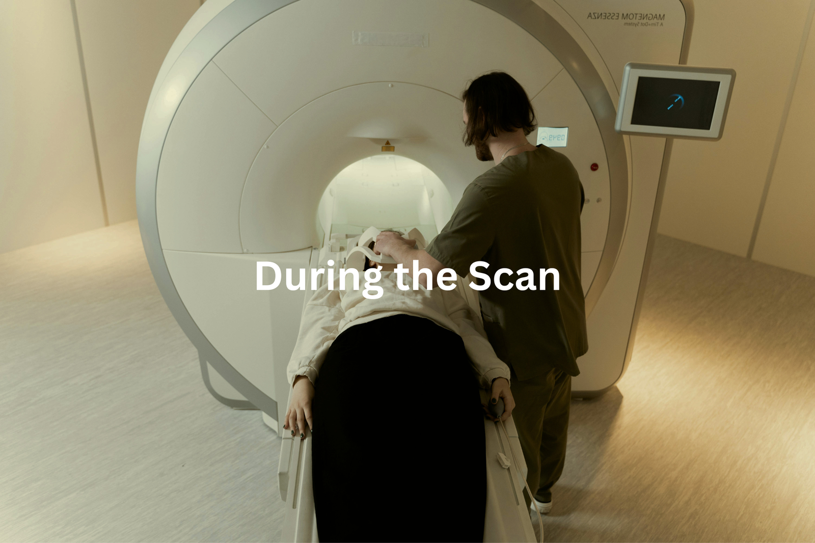 A person lying on a medical imaging machine during a scan procedure