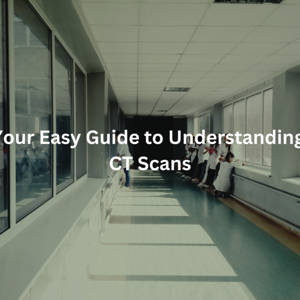 Long hospital hallway with people walking inside, showcasing the title "Your Easy Guide to Understanding CT Scans