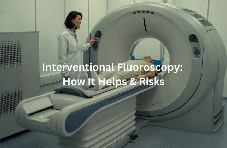 View of a patient undergoing an interventional fluoroscopic examination, with a medical professional controlling the imaging equipment in the background.
