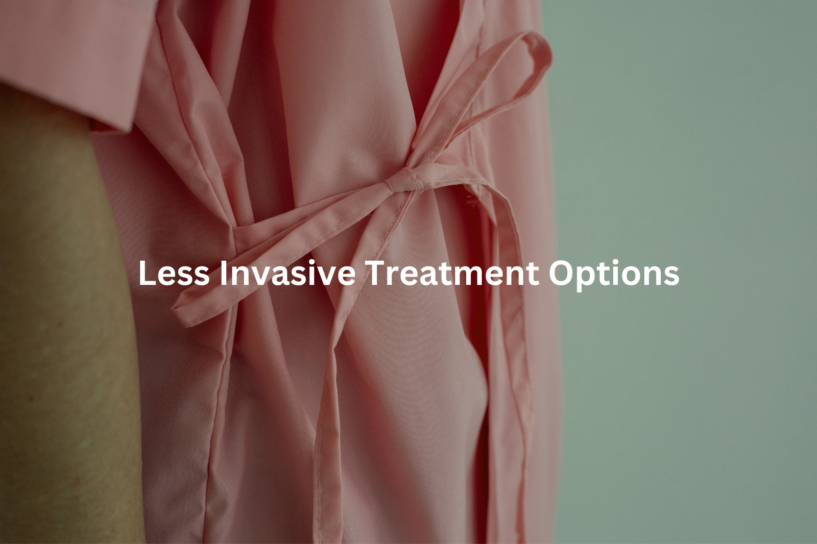 Soft pink robe with a tie-waist detail representing the idea of less invasive treatment options